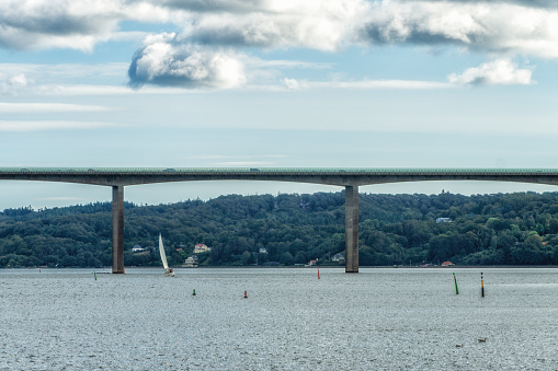The Vejle Fjord bridge leads traffic outside from the local town, Vejle, and shortens the trip with 10 minutes