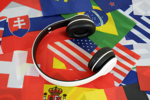 istock Headphones on many national flags background. 1762881393
