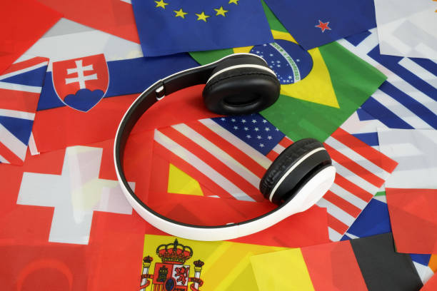 istock Headphones on many national flags background. 1762881911