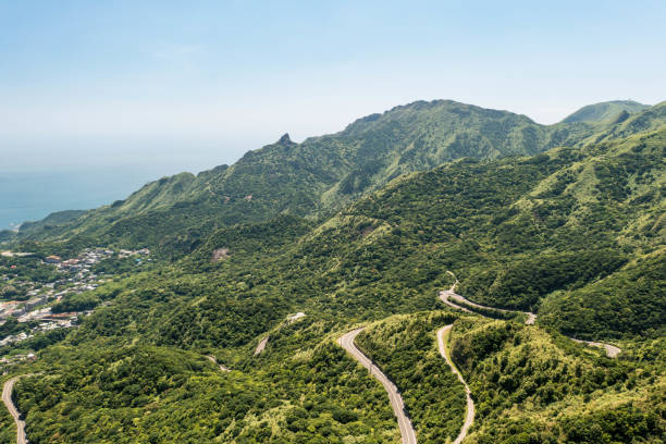 istock Under the Blue Sky: Scenic Mountain Road in Jiufen 1762904655