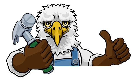 An eagle cartoon animal mascot carpenter or handyman builder construction maintenance contractor peeking around a sign holding a hammer and giving a thumbs up