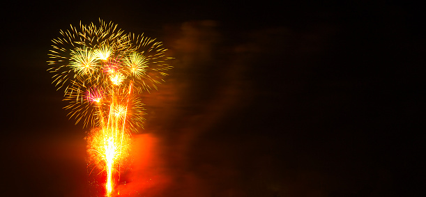 Firework Background Night Party Dark Black Sky Fire Effect Fun Joy Happy New Year Celebrate Fourth Festive Light Shape Glow Display Scene Free Space Backdrop Red Orange Color Sparker Winter Season.