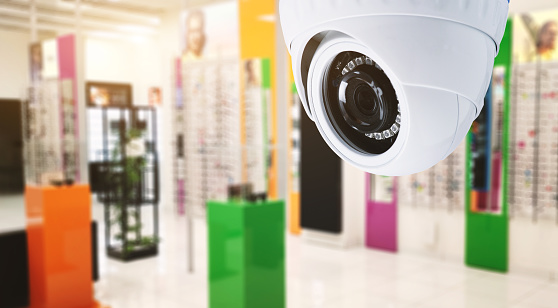 CCTV camera inside the store, blur background glasses store