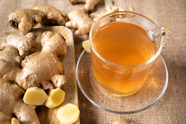 istock Ginger and ginger ale on a wooden table 1762934825