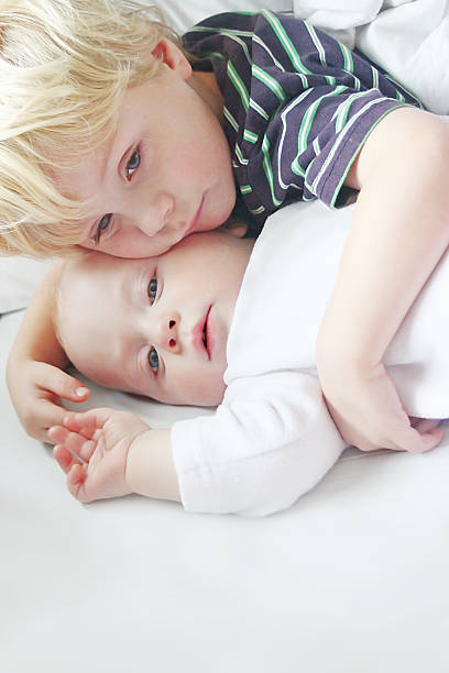 istock Child Snuggling his Baby Brother 176294671