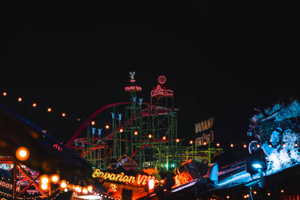 At the fair with rides and delicious things.
