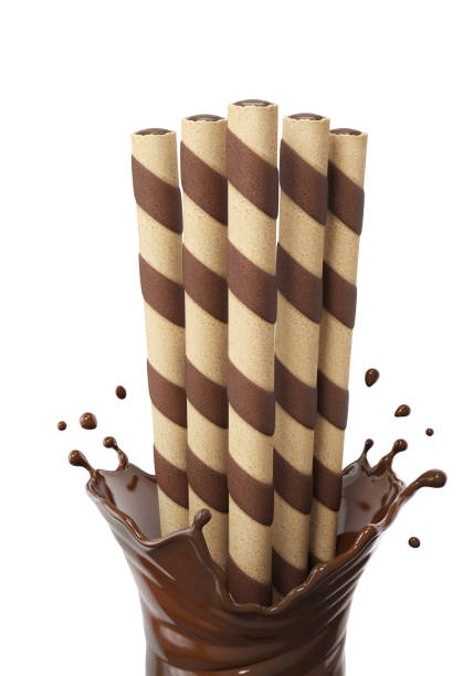 istock chocolate filled in a crispy wafer roll, Chocolate waffle sticks with chocolate splash 3d rendering. 1763033623