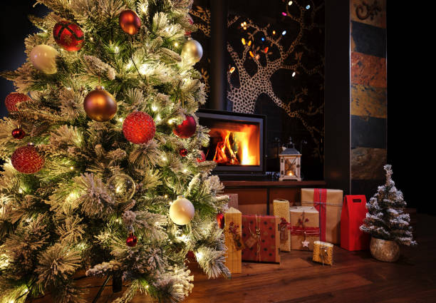 istock Christmas tree decorated with traditional Christmas decorations, illuminated by Christmas lights that flash with a play of shadows and lights wishing you a Merry Christmas. The snow-covered pine branches with decorated Christmas balls, in the foreground g 1763034675