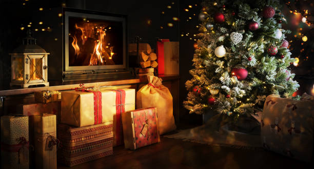 istock Christmas tree decorated with traditional Christmas decorations, illuminated by Christmas lights that flash with a play of shadows and lights wishing you a Merry Christmas. The snow-covered pine branches with decorated Christmas balls, in the foreground g 1763036275