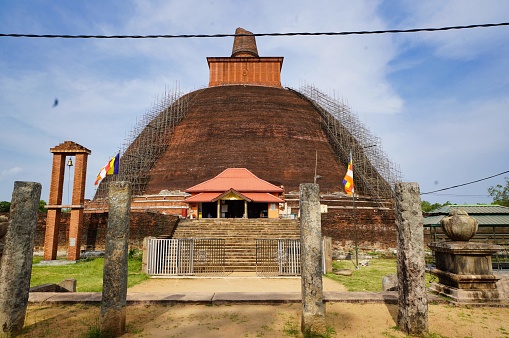 Jethawana Dagoba, Anuradhapura, Sri Lanka - May 07, 2022: Standing as a beacon of Sri Lanka's rich history, the awe-inspiring Jethawanaramaya emanates a profound sense of cultural and spiritual importance, captivating all who lay eyes upon it.