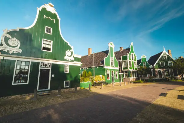 Photo of Famous Dutch village Zaanse Schans just outside Amsterdam. Fabulous unique buildings. Historic tourist destination for cheese making