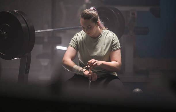 istock Athlete Woman Wrapping Bandage 1763069462