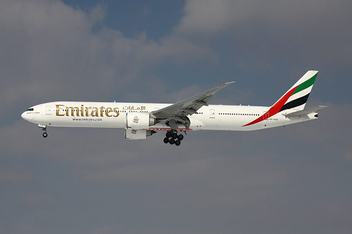 Frankfurt am Main, Germany - March 15, 2013: Emirates Boeing 777-300 with registration A6-ECQ on short final for runway 25L of Frankfurt Airport.