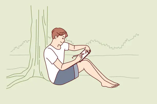 Vector illustration of Man draws in electronic tablet sitting on shore of lake and enjoying landscape of morning nature