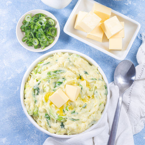istock Delicious homemade Irish dish Colcannon or mashed potato with green cabbage, square top view 1763172863