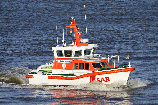 Portland, Maine, USA - August 9, 2009: Coast Guard vessel crossing Casco Bay near Portland, Maine