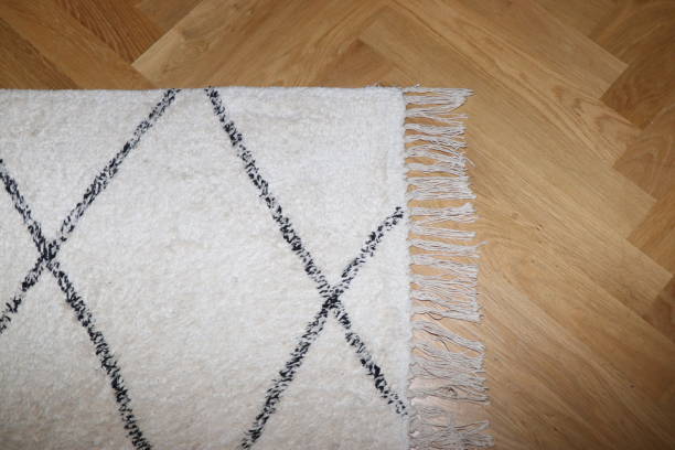 istock Scandinavian-style carpet on a wooden parquet 1763200527