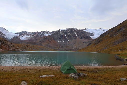 Camping at Kol Tor lake located above Kol Ukok in Tian Shan Mountains, Naryn region, Kyrgyzstan, Central Asia