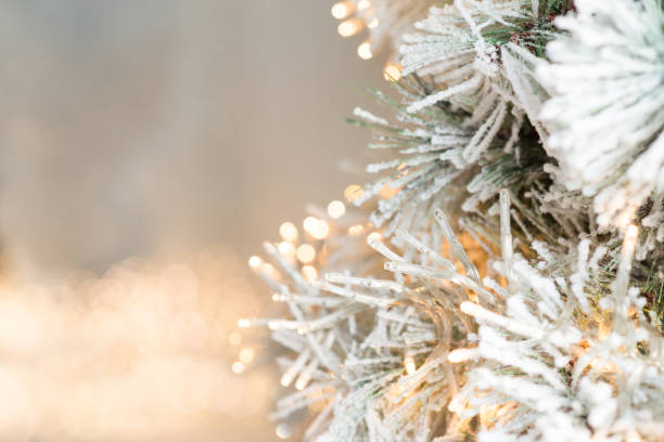 istock Christmas tree branches with decorations garlands, bokeh. Postcard with space for text. Merry christmas card. Winter holiday theme. Happy New Year. 1763223238