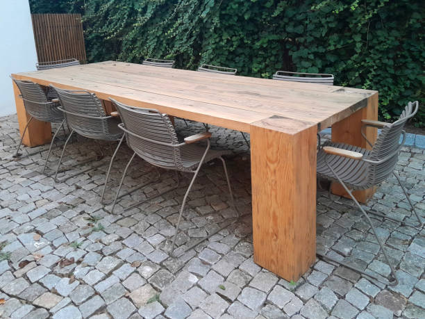 istock metal chairs around a large wooden table 1763253508