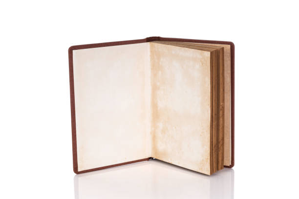 Open old book isolated on white background with clipping path.