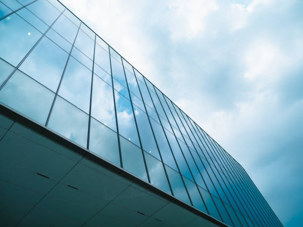 istock glass buildings with cloudy blue sky background 1763303377