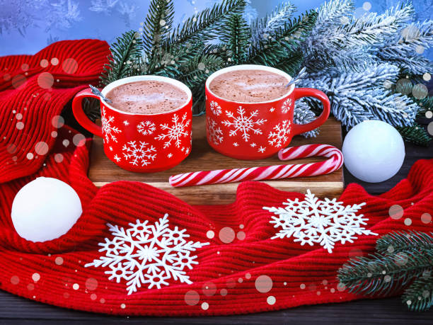 istock Christmas composition with two red cups of coffee, snowflakes 1763305417