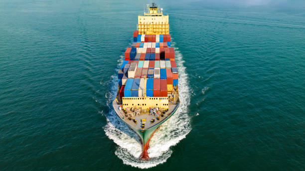 istock container ship full speed in sea, import export global business and industry service, commercial trade logistic and transportation of international , container cargo freight shipping, aerial front view 1763314141