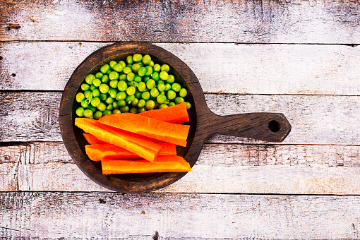 Organic Fresh Green Pea and Carrot Salad Pattern Background