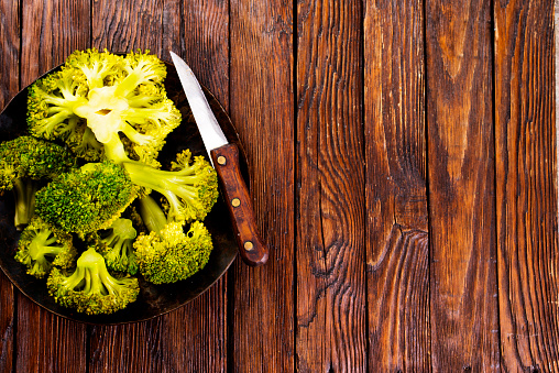 Healthy Green Organic Raw Broccoli on plate