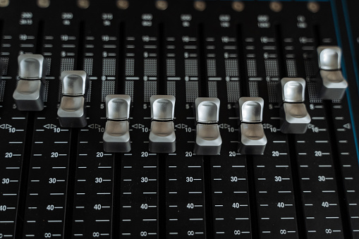 DJ remote buttons. Audio device mixer. Technology in the entertainment industry. High quality photo