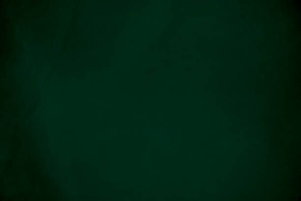 istock Dark green velvet fabric texture used as background. Emerald color panne fabric background of soft and smooth textile material. crushed velvet .luxury emerald tone for silk. 1763329607