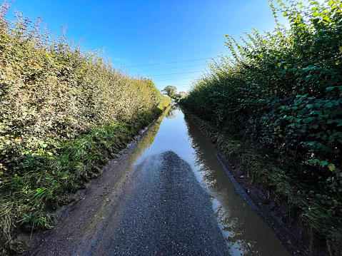 Country lane in Norfolk after heavy rain