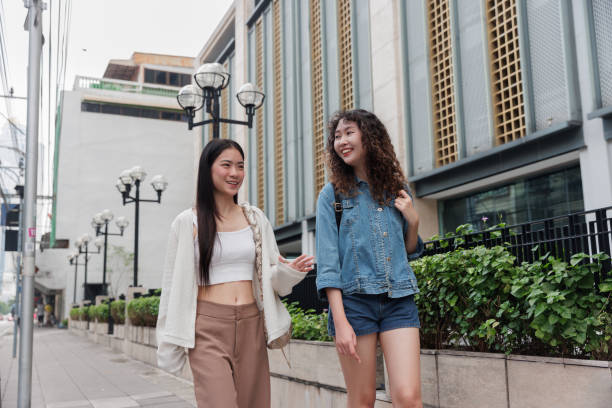 istock Two young women walking in downtown, Bangkok 1763349983