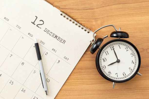 istock A calendar and an alarm clock on the desk. 1763357931