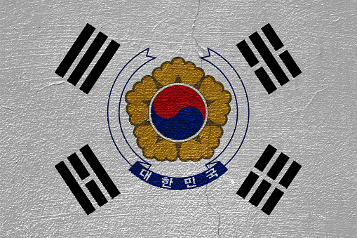 Flag and coat of arms of Republic of Korea on a textured background. Concept collage.