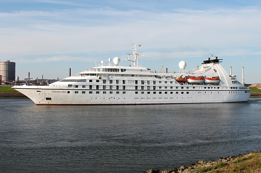 Ijmuiden, Netherlands - August 12, 2012: Seabourn Cruise Line  cruise ship Seabourn Pride leaving the lock of Ijmuiden
