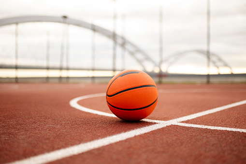 Close up of Basketball on Court Floor