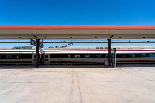 Renfe company trains parked at the Toledo station on a summer day. Castilla la Mancha. Spain. July 29, 2023.