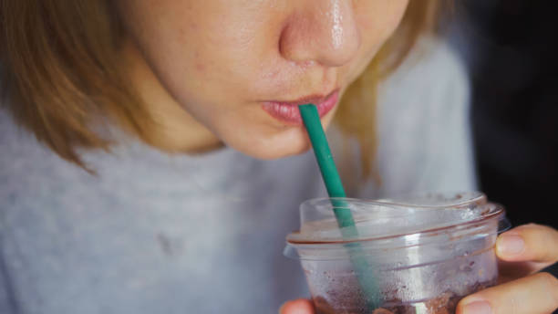 istock Asain Young woman drink Chocolate ice at home. 1763448321