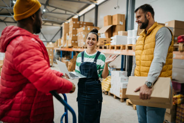 istock Young female manager with her coworkers and  a checklist 1763459349