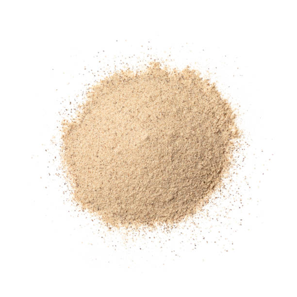 istock Heap of ground white pepper isolated on white background 1763479328