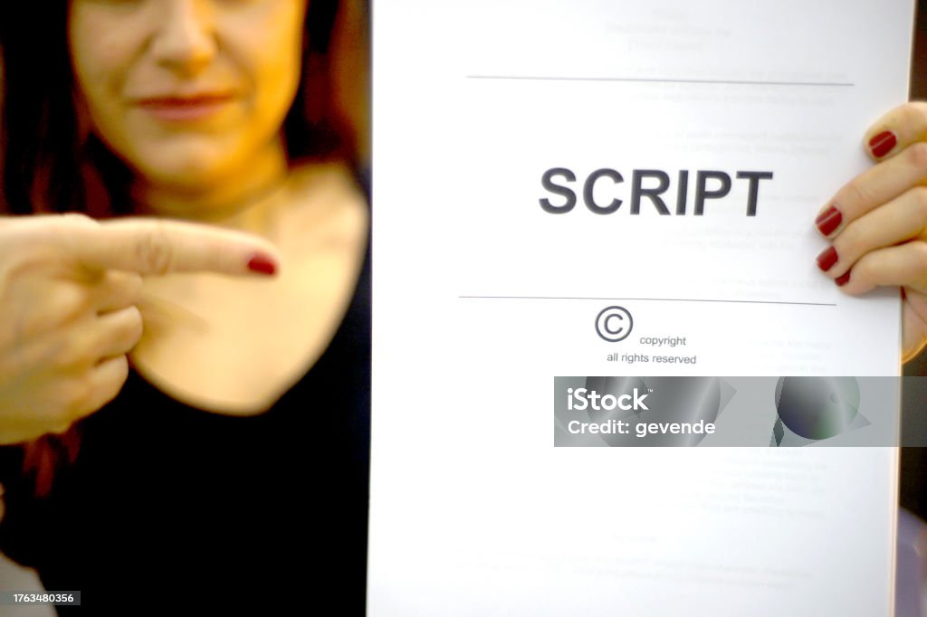Screenwriter Holds Folder Of Documents Labeled Script Stock Photo ...