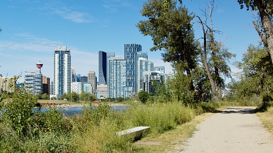 Footpath with Bench by the River in Calgary, Alberta