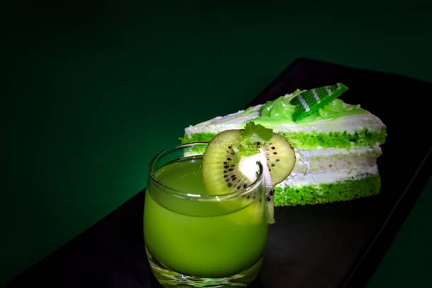 istock Dessert. pastry, mango drink, green grapes on dark background. bright. macro. close up 1763488306