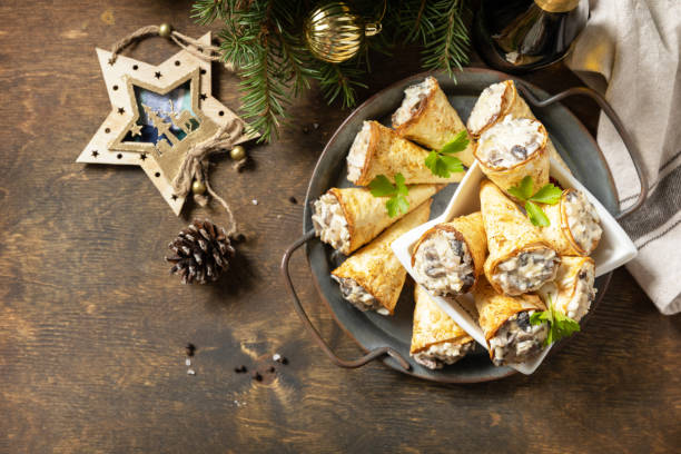 istock Creative appetizers christmas. Lavash roll cone with chicken and mushroom salad on a plate. Top view, flat lay. Copy space. 1763505921
