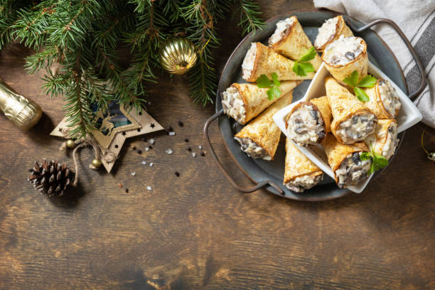 istock Creative appetizers christmas. Lavash roll cone with chicken and mushroom salad on a plate. Top view, flat lay. Copy space. 1763506419
