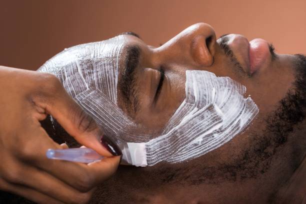 istock Therapist Applying Face Mask To Man 1763521771