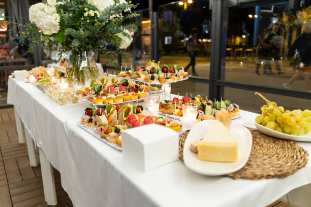 istock Banquet table with different food snacks and appetizers for party 1763532459