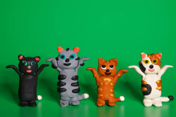 istock Funny toy cats stand on their hind legs. 1763533725